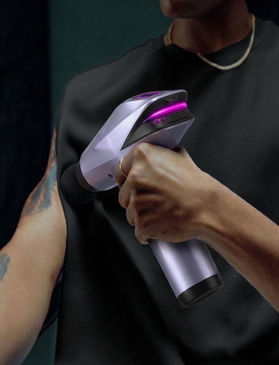 EVURON ARC Pro held against the upper chest, the lit control face visible under the hand.